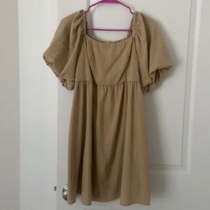 And now this women’s size 0X tan dress